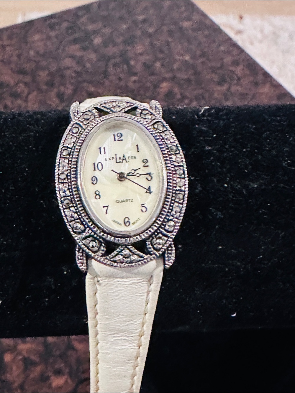 La express leather band Oval Crystal Bezel Watch in Cream